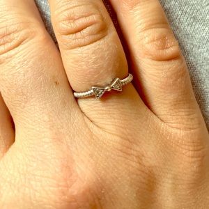 Sterling silver tiny bow ring